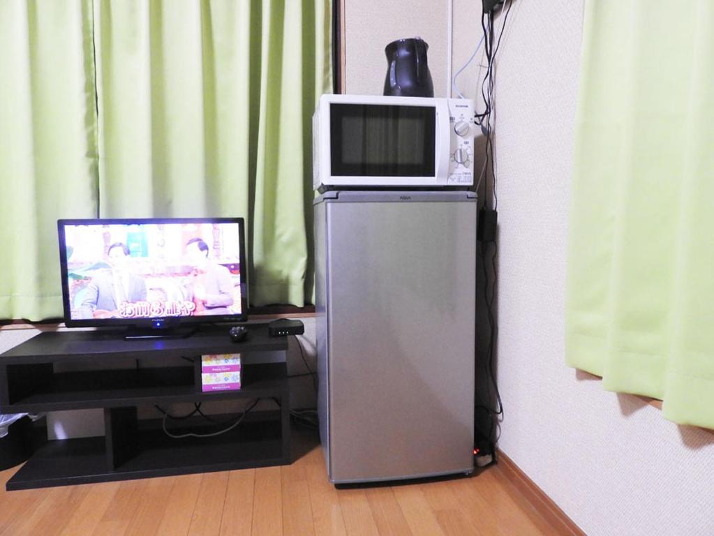 TV a/nebo společenská místnost v ubytování 冨の露～とみのつゆ～