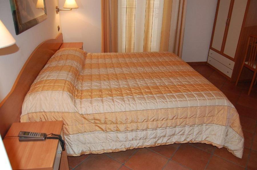Postel nebo postele na pokoji v ubytování Il Rustico