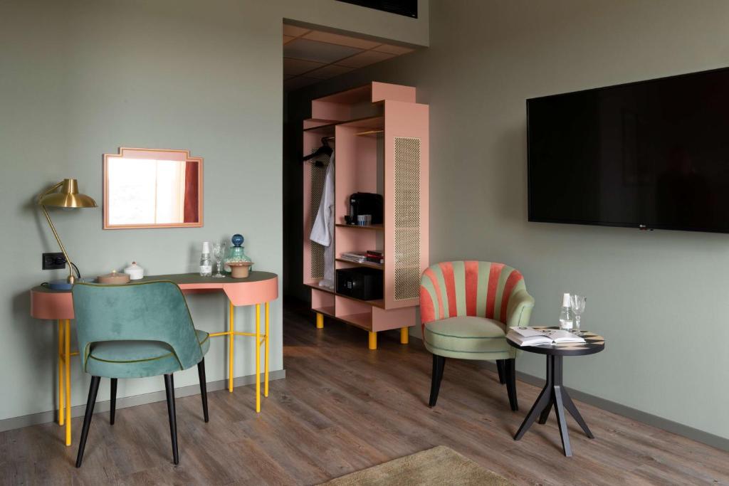 TV a/nebo společenská místnost v ubytování Best Western Plus Åby Hotel