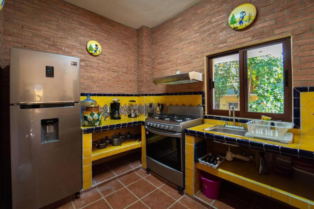 Kuchyň nebo kuchyňský kout v ubytování Casa palmito cerca de la playa