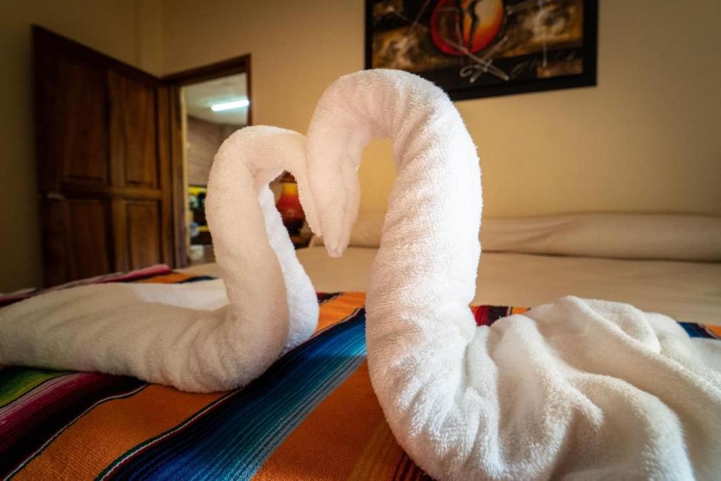 Postel nebo postele na pokoji v ubytování Casa palmito cerca de la playa