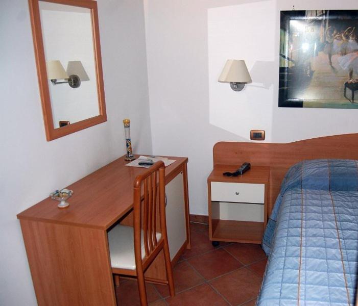 Postel nebo postele na pokoji v ubytování Il Rustico
