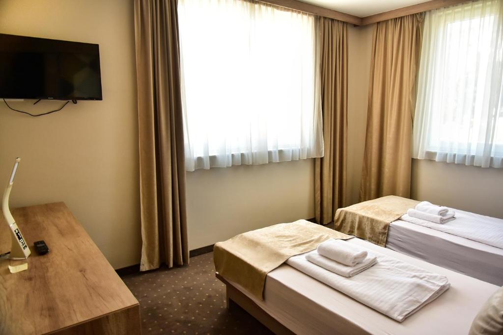 Postel nebo postele na pokoji v ubytování Student Hotel Mostar