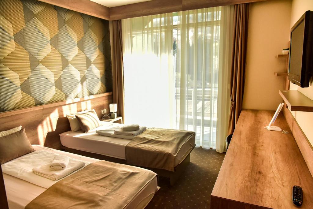 Postel nebo postele na pokoji v ubytování Student Hotel Mostar