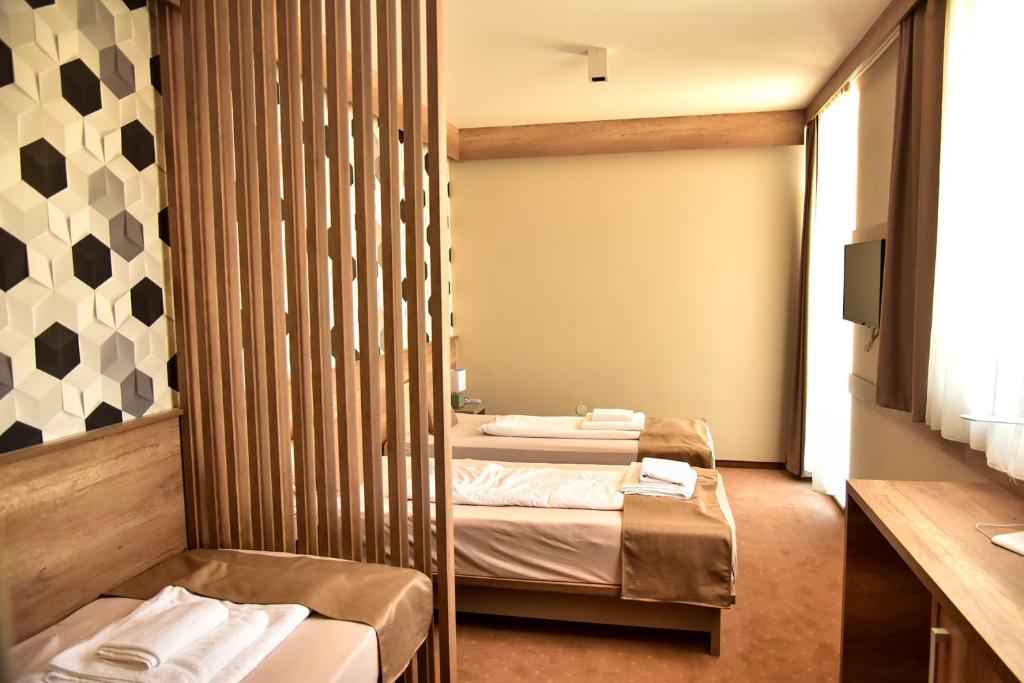 Postel nebo postele na pokoji v ubytování Student Hotel Mostar