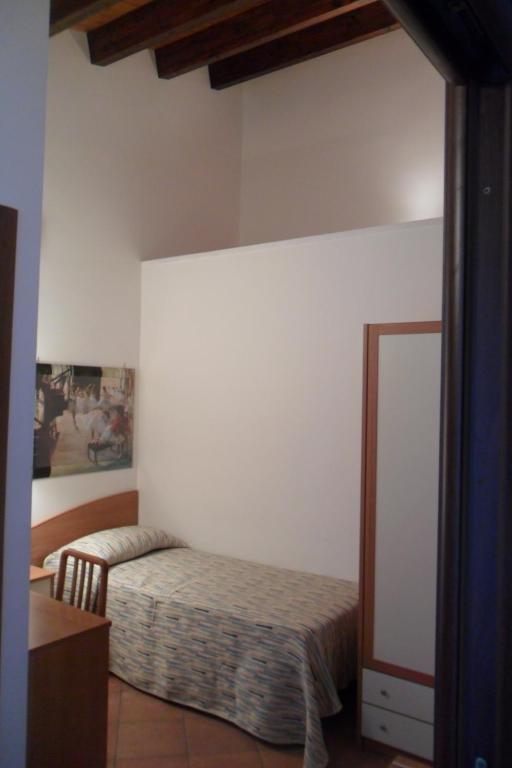 Postel nebo postele na pokoji v ubytování Il Rustico