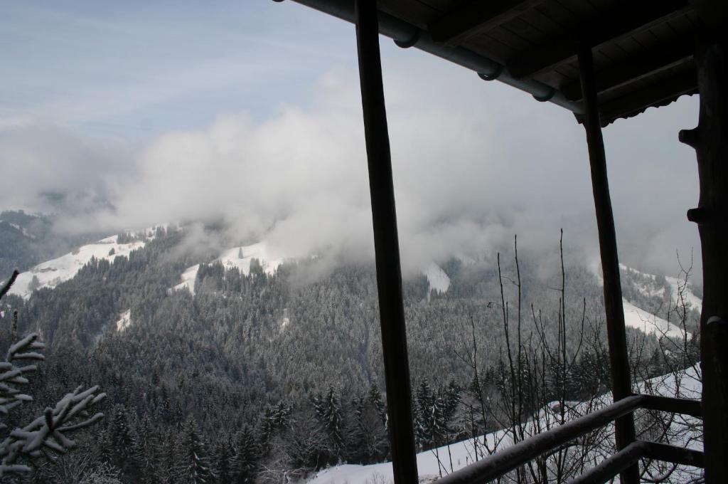 a room with a view of a snowy mountain at Ferienhaus Soregina in Ellmau