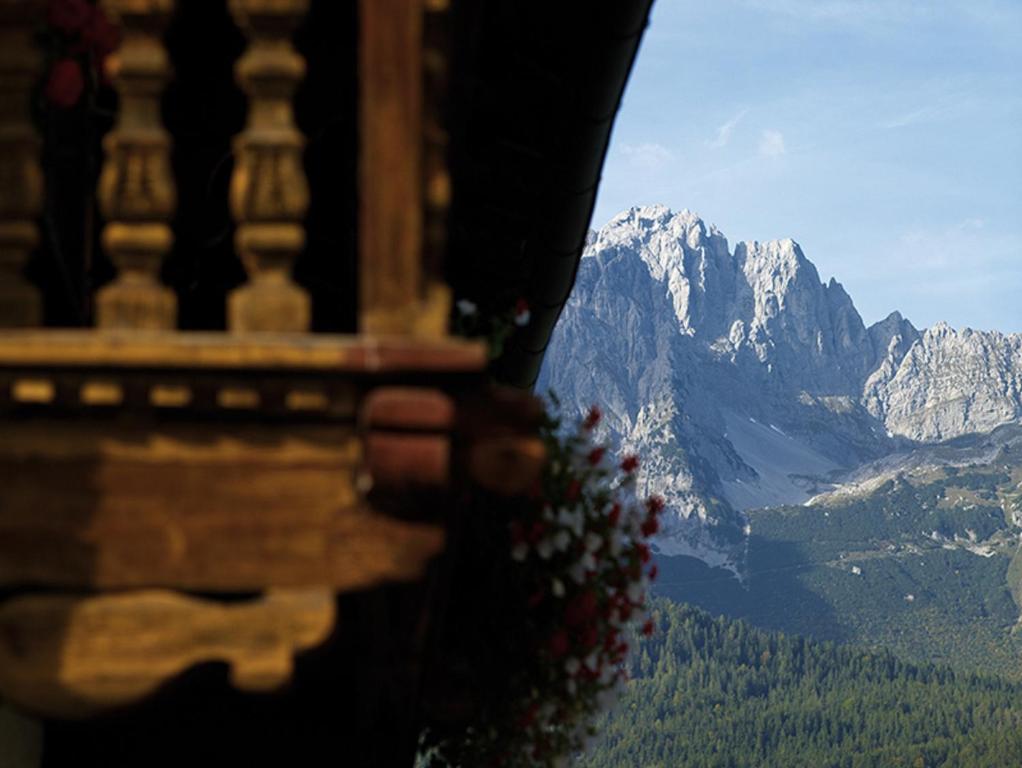 a view of a mountain range from a balcony at Ferienhaus Soregina in Ellmau