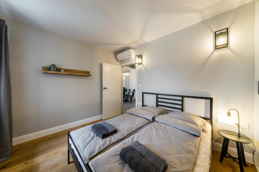 Posteľ alebo postele v izbe v ubytovaní Groble Residence WAWELOFTS
