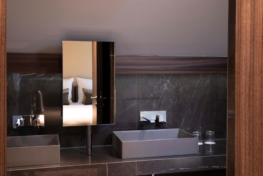 Koupelna v ubytování Hotel D Geneva