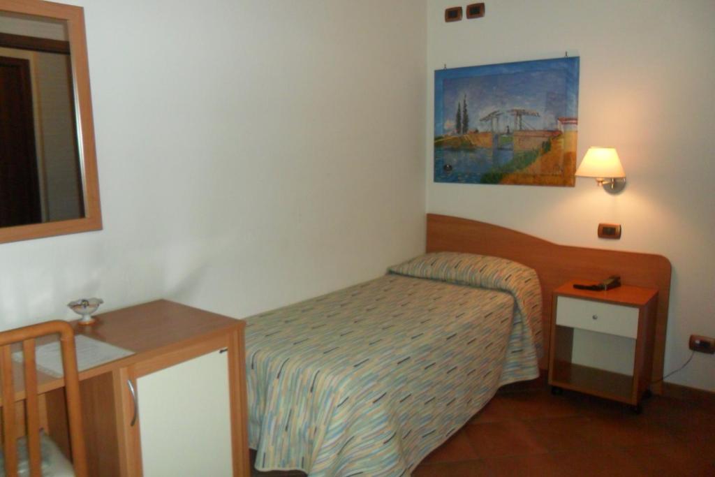 Postel nebo postele na pokoji v ubytování Il Rustico