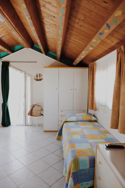 Postel nebo postele na pokoji v ubytování Hotel Marconi