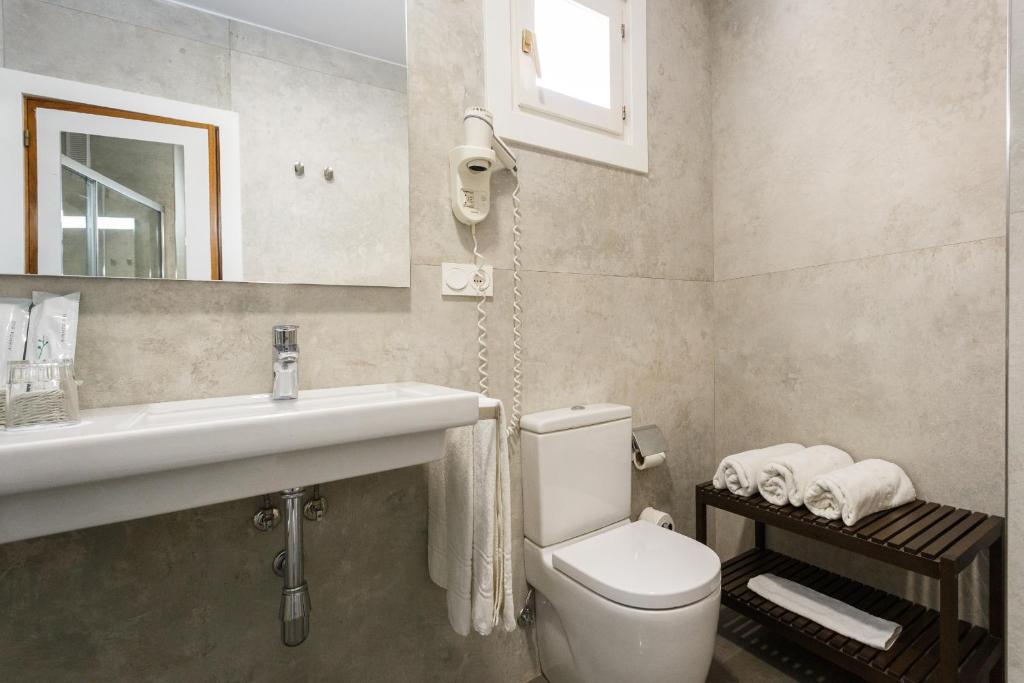 A bathroom at Hotel Comfort Dauro 2