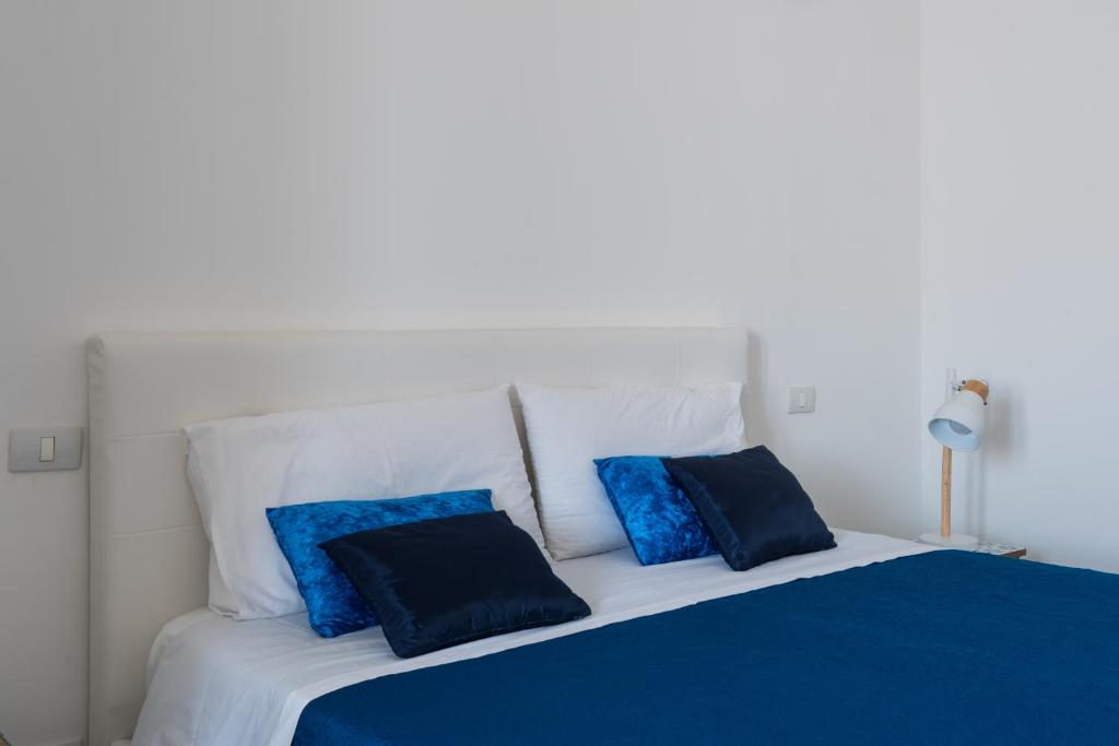 A bed or beds in a room at AM Suite with terrace by Wonderful Italy