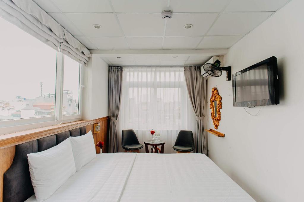 TV a/nebo společenská místnost v ubytování Hanoi Asia Hotel