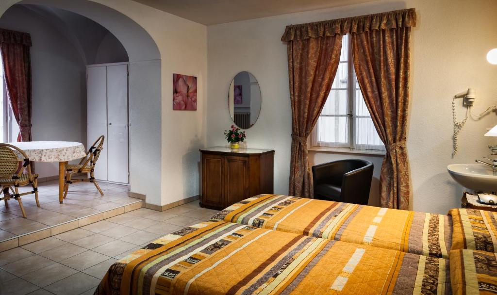 Rúm í herbergi á EasyRooms dell'Angelo