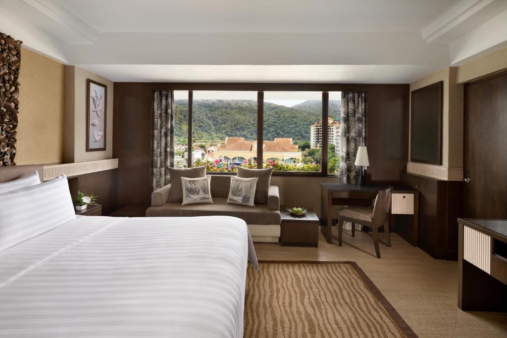 Voodi või voodid majutusasutuse Shangri-La Golden Sands, Penang toas