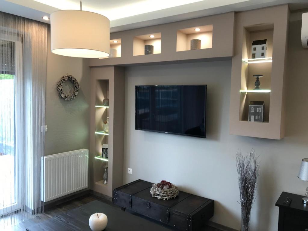 TV a/nebo společenská místnost v ubytování Orient Suite
