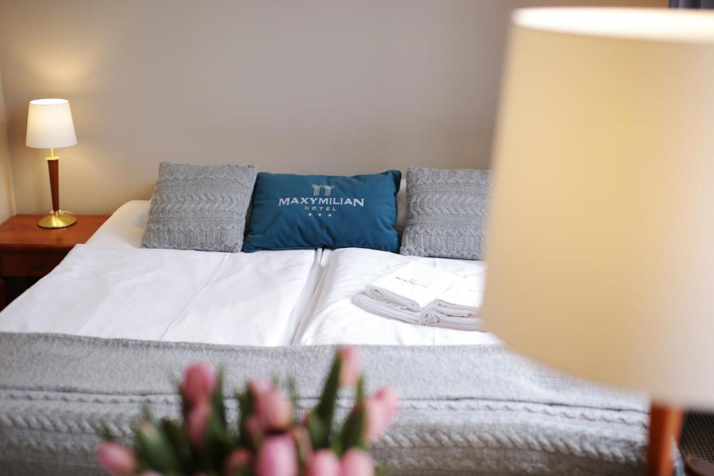 Postel nebo postele na pokoji v ubytování Maxymilian Unique Hotel - Adults Only