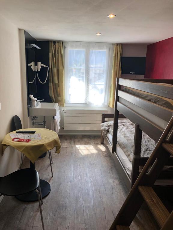 Postel nebo postele na pokoji v ubytování Hotel Steinbock