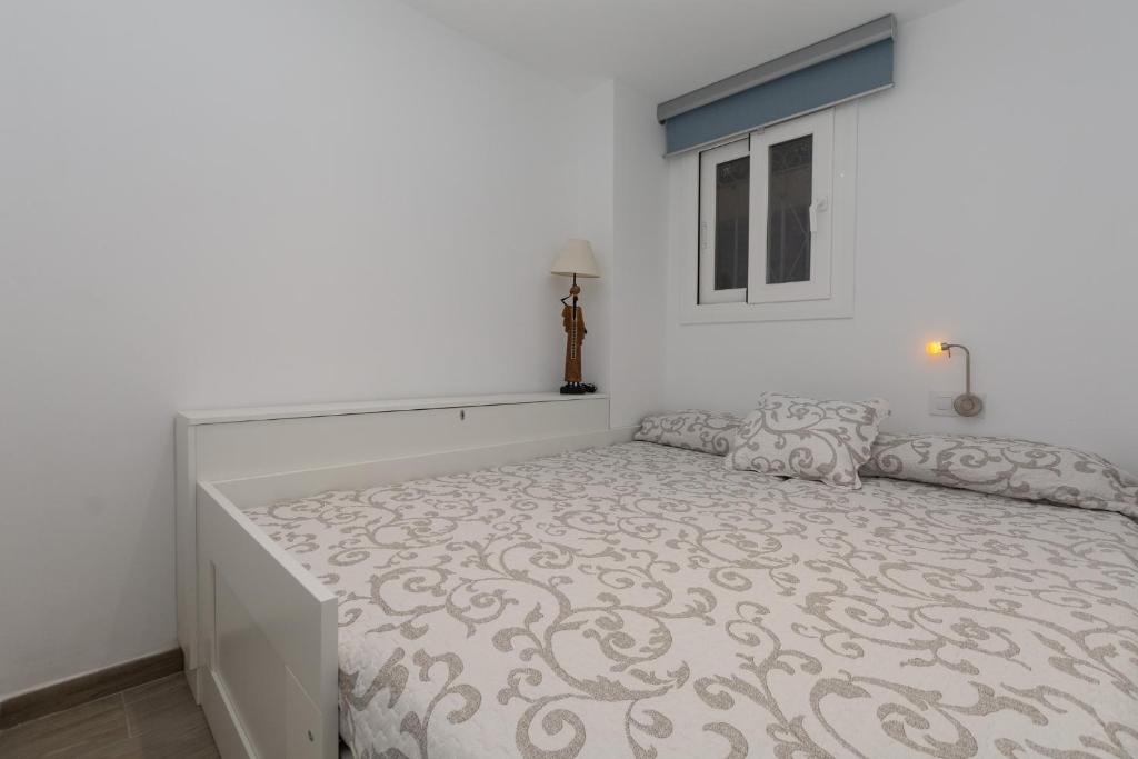 Posteľ alebo postele v izbe v ubytovaní Apartment Rocamar 26