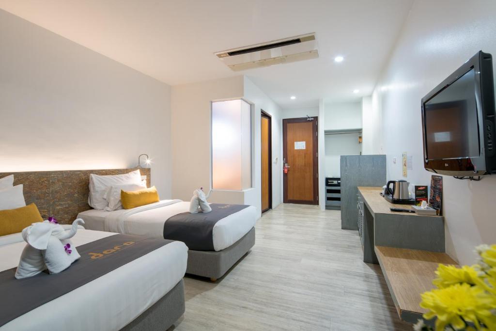 TV a/nebo společenská místnost v ubytování DARA Hotel - SHA Plus
