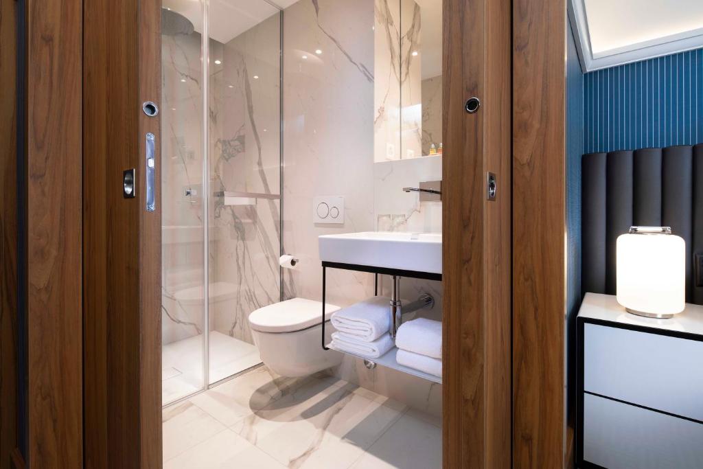 Koupelna v ubytování Hotel D Geneva