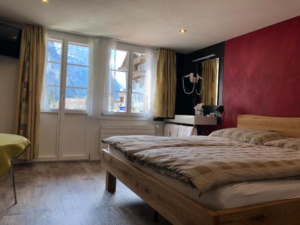 Postel nebo postele na pokoji v ubytování Hotel Steinbock
