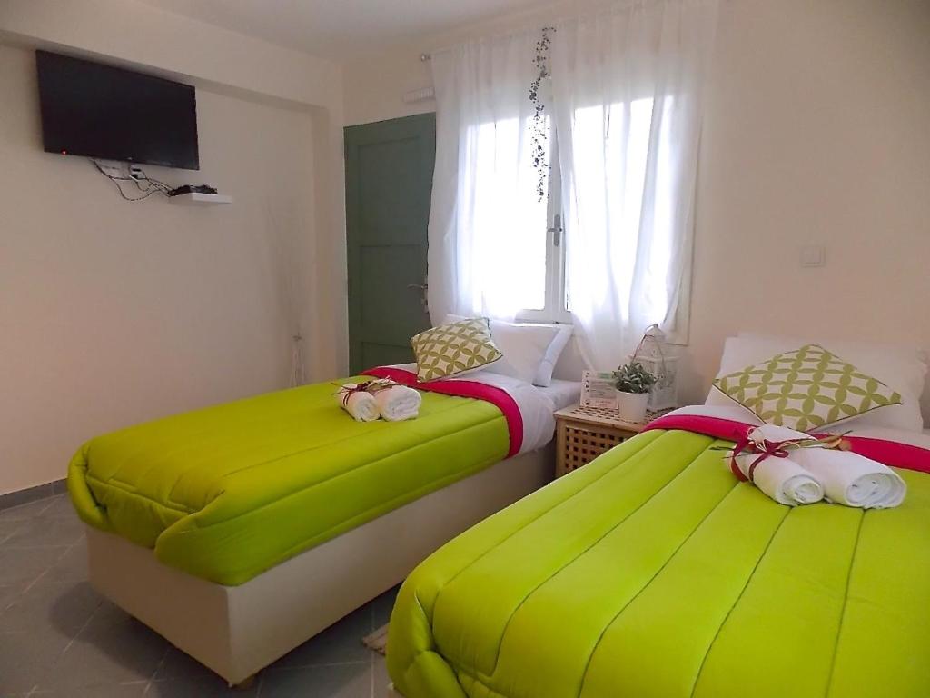 Postel nebo postele na pokoji v ubytování Filippos Resort II by Karidi