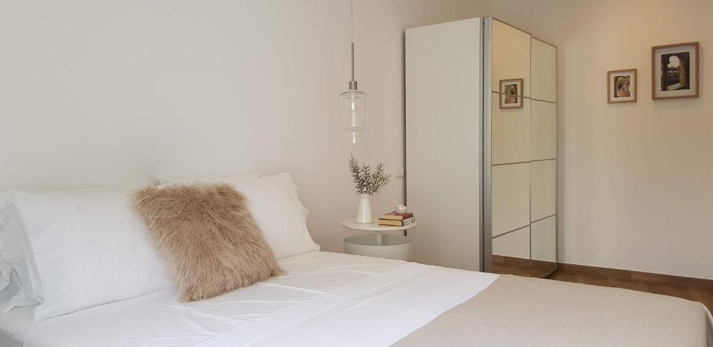 Postel nebo postele na pokoji v ubytování Casa da Mouraria
