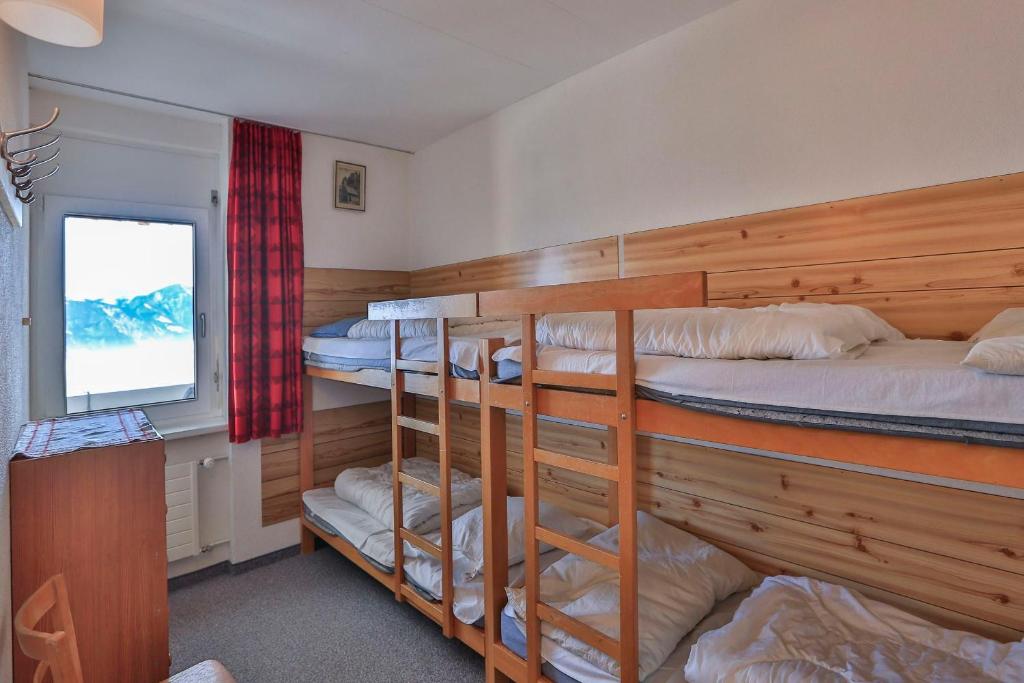 Poschodová posteľ alebo postele v izbe v ubytovaní Haus Wogesa - CharmingStay