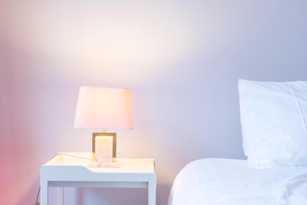 Postel nebo postele na pokoji v ubytování B&B Belle de Nuit