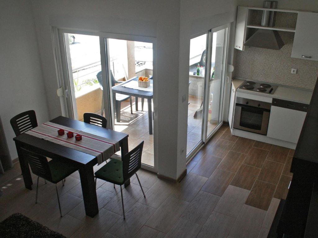 Kuchyň nebo kuchyňský kout v ubytování Apartments Kristina