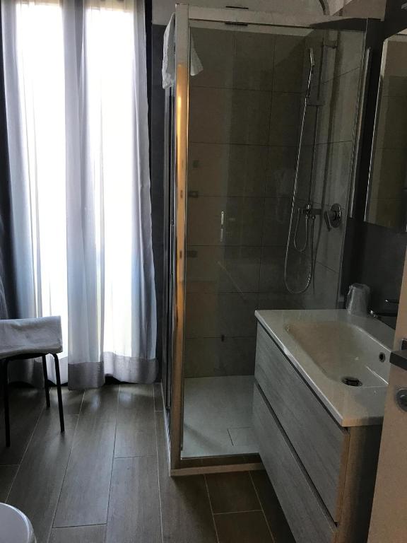 Koupelna v ubytování ROMA ROOMS