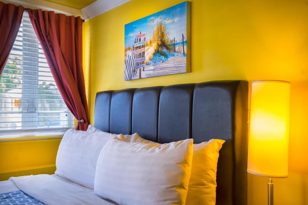 Postel nebo postele na pokoji v ubytování Pegasus International Hotel