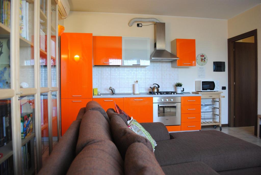 A kitchen or kitchenette at Bnbook - Volta Fiera Milano