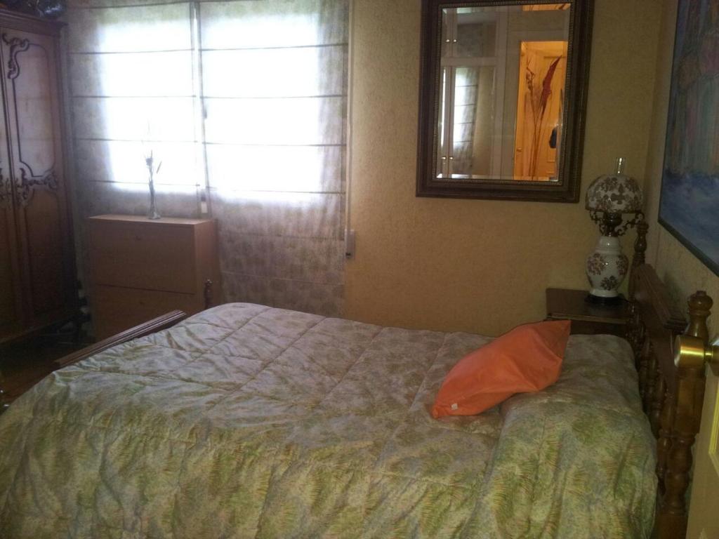 A bed or beds in a room at Precioso PISO en Villafranca del Bierzo