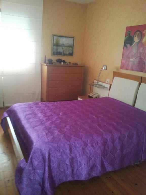 A bed or beds in a room at Precioso PISO en Villafranca del Bierzo