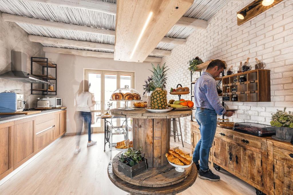Kuchyň nebo kuchyňský kout v ubytování B&B I Cinque Mori