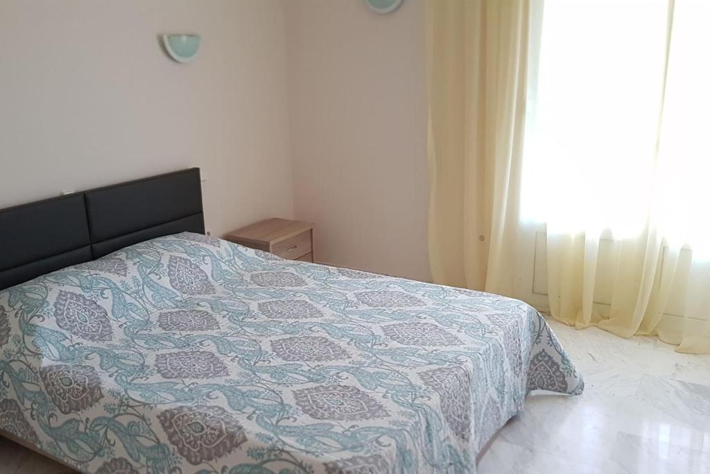 Postel nebo postele na pokoji v ubytování Galini Apartment