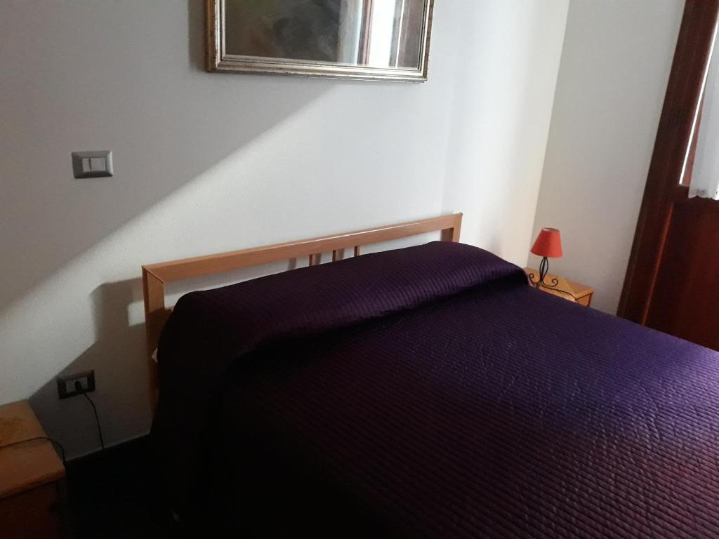 Postel nebo postele na pokoji v ubytování B&B Il Brigante