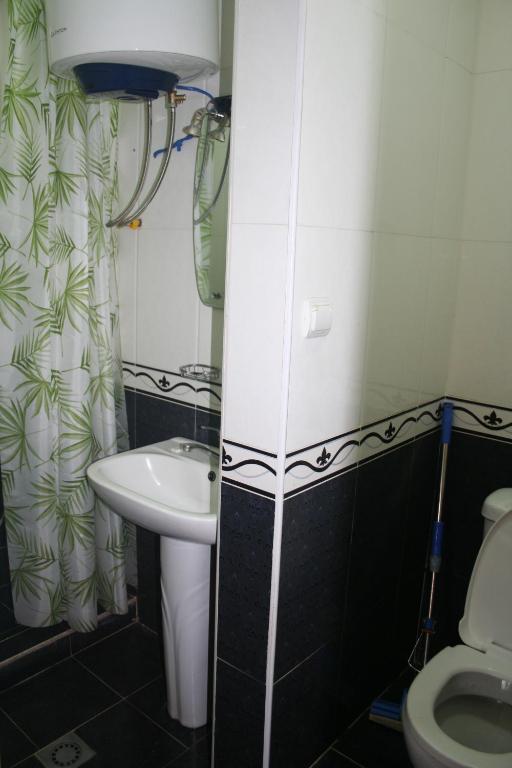 Koupelna v ubytování Hotel Noy