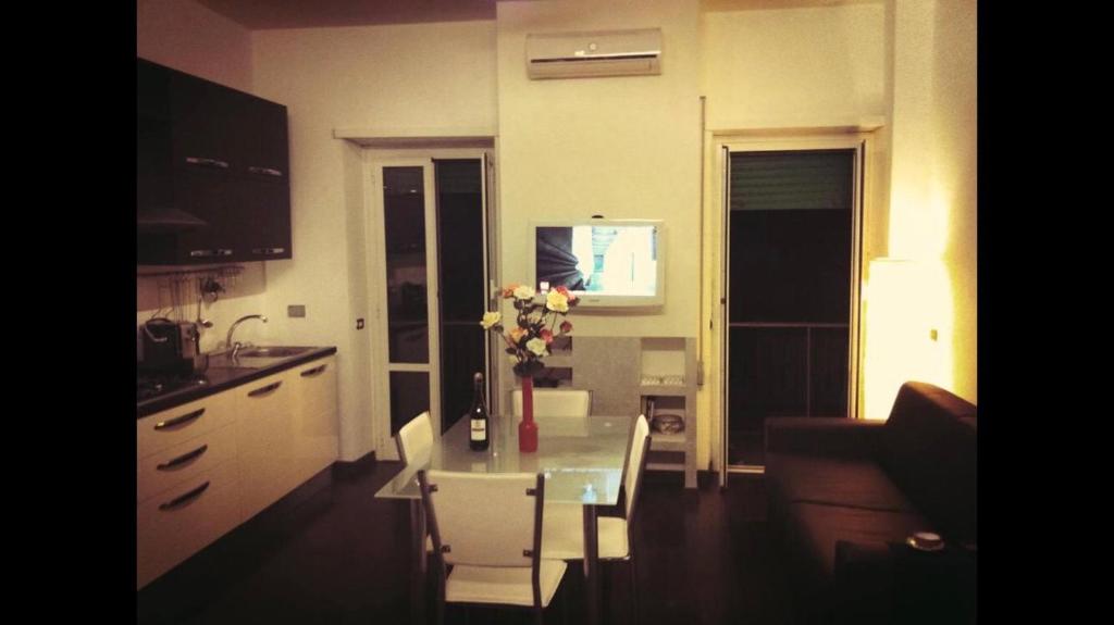 A television and/or entertainment centre at La Pinetina Roma