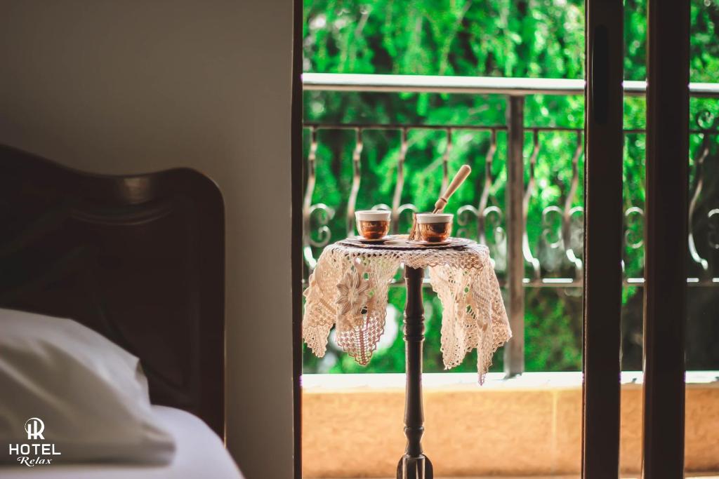 Postel nebo postele na pokoji v ubytování Hotel Relax