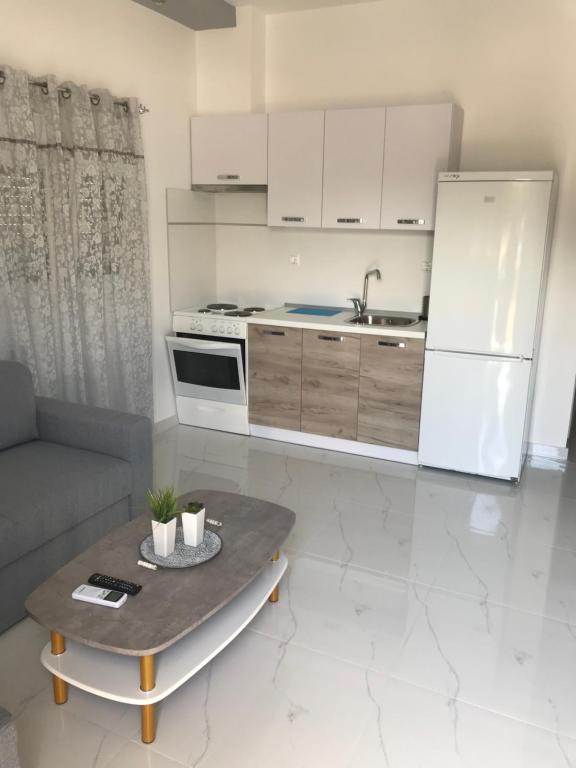 A kitchen or kitchenette at Stratonikis Apartments