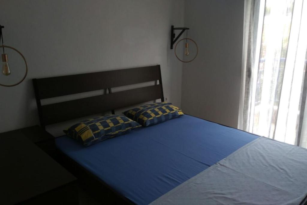 Postel nebo postele na pokoji v ubytování Posidi Holidays Apartments