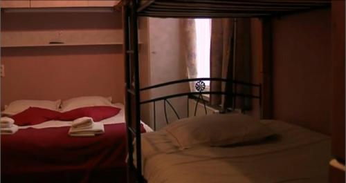 Postel nebo postele na pokoji v ubytování Hotel Anvers