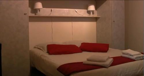 Postel nebo postele na pokoji v ubytování Hotel Anvers