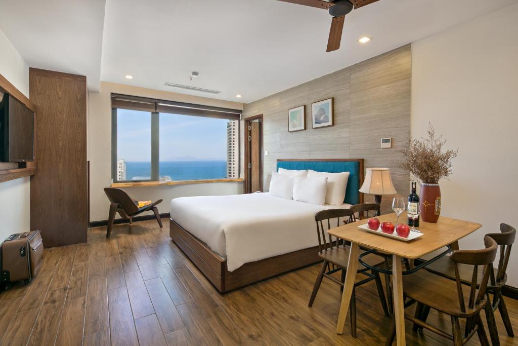 Giường trong phòng chung tại White Sand Boutique Hotel
