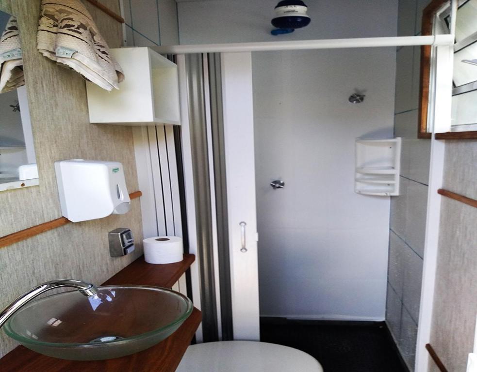 a bathroom with a sink and a toilet at Hostel Brooklin in Sao Paulo